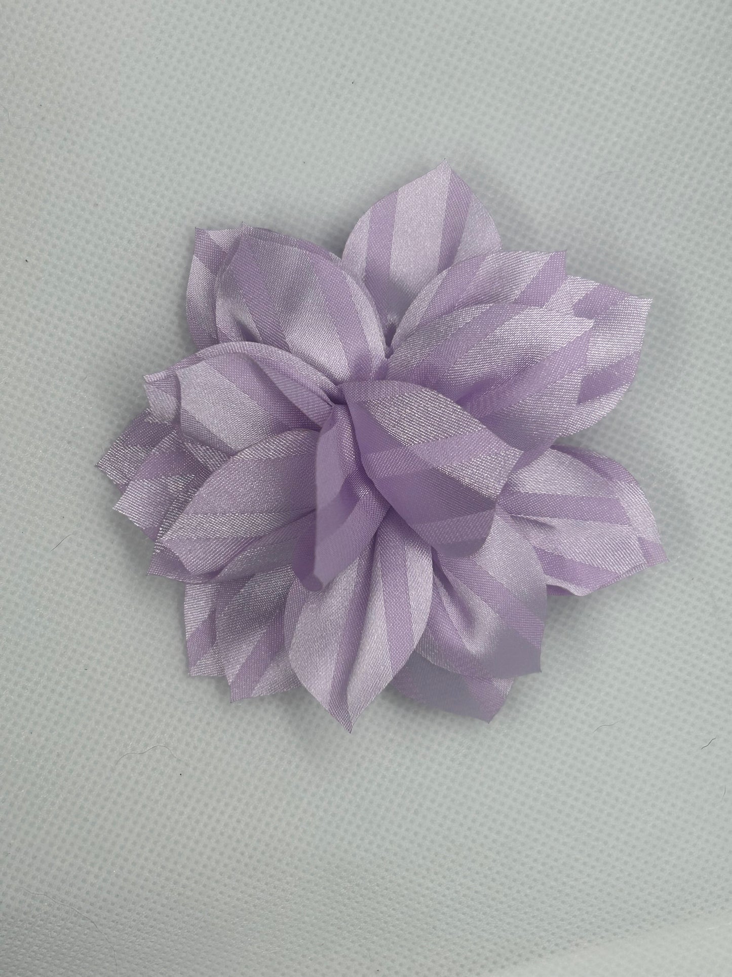 Purple silky flower hair clip